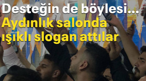 Desteğin de böylesi… Aydınlık salonda ışıklı slogan attılar